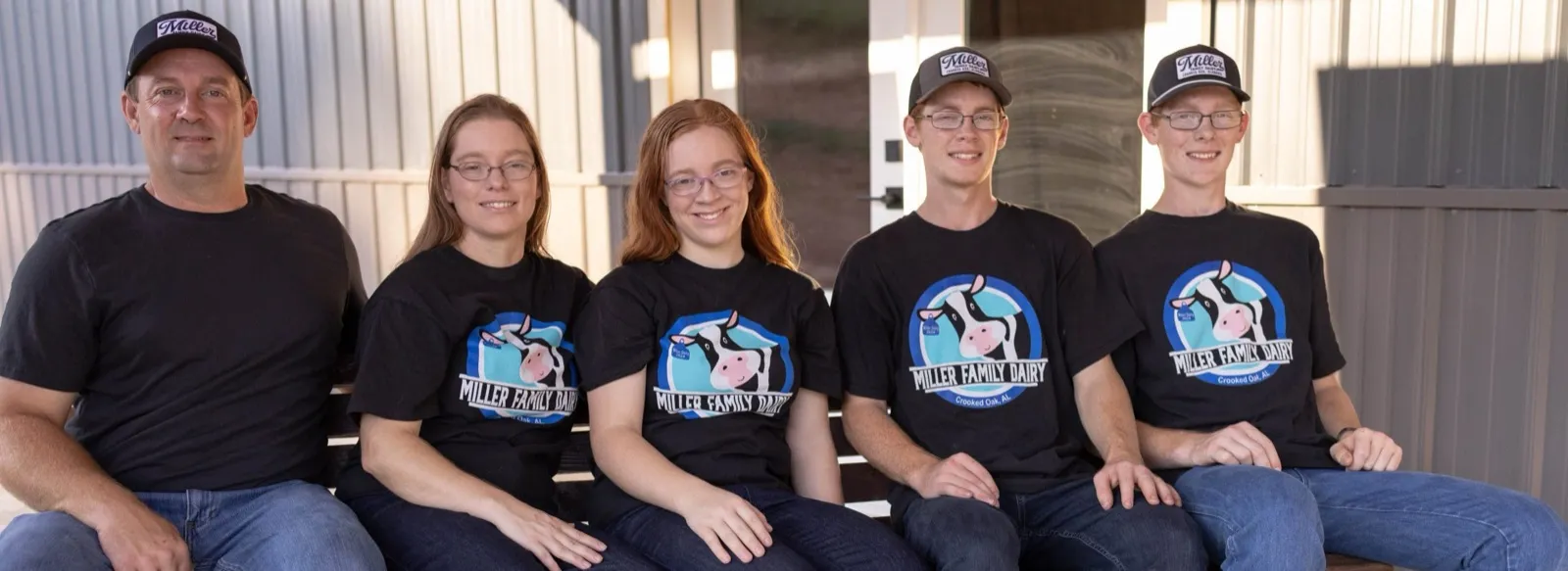 The Miller family on the porch of their dairy